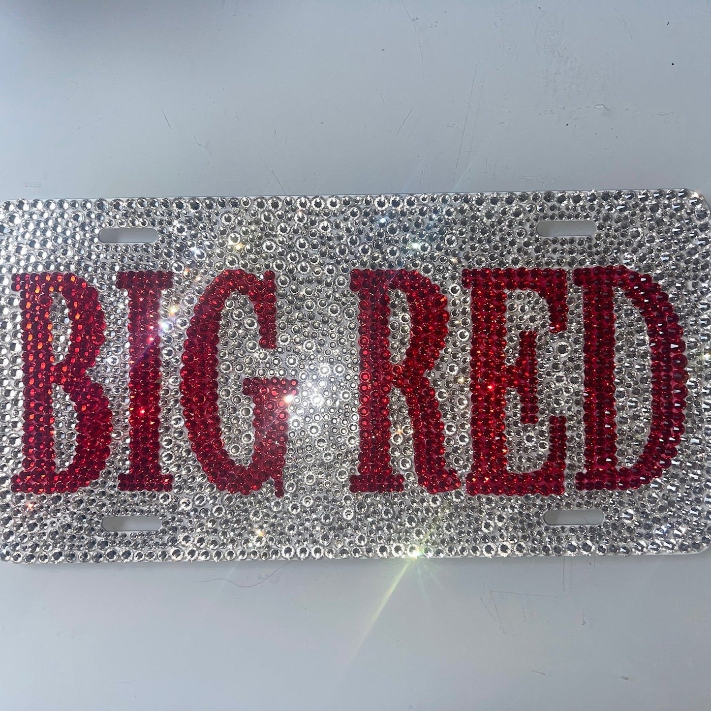 Custom red crystal license plate